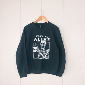Stock & Belle "Staying Alive" Skeleton Coffee Graphic Crewneck Sweatshirt Black